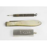 A silver ingot and mother of pearl pen knife, and a propelling pencil. (3)
