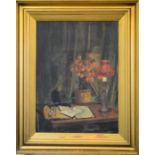 A still life depicting a writing set, lamp and flowers, unsigned, oil on canvas, 75 by 55cm.