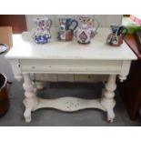 A Victorian pine washstand, painted white.