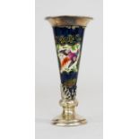 A 19th century porcelain and silver rose vase, depicting a bird, 14cm high.