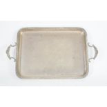 A silver plated tea tray, makers stamp S&L verso.
