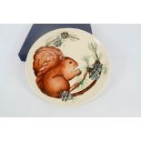 A Moorcroft year plate, Fourth Edition, depicting a squirrel, 1995, presented by William