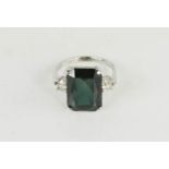 An 18ct white gold ring, with square cut stone, possibly tourmaline, 5g.