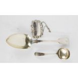 A silver tablespoon, sherry label, and small silver ladle, 3.51toz.