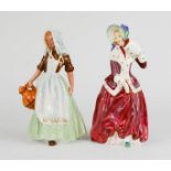Two Royal Doulton figures; Christmas Morn HN1992 and The Milkmaid HN2057, 18cm high.