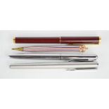 A Parker fountain pen together with two German fountain pens and a propelling pencil.