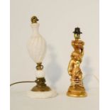 A marble table lamp, together with a cherub form lamp base.