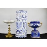 A blue and white umbrella stand, Victorian urn on stand and a comport. (3)