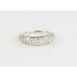 An 18ct white gold and diamond pave set ring, 3.8g.