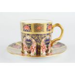 A Royal Crown Derby coffee can and saucer.