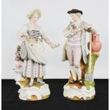 A pair of German porcelain lady and gentleman with watering can.