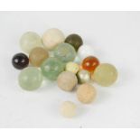 A group of antique marbles.