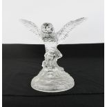 A pressed glass owl with outspread wings, 18cm high.
