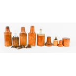 A group of antique treen apothecary jar holders, some containing original glass bottles.