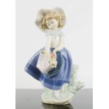 Lladro young girl with flowers