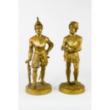 A pair of gilt metal knights in armour.