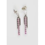 A pair of 18ct white gold drop earrings, set with pink stones, 5.3g.