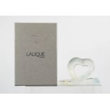 A Lalique Ribbon Heart ornament, 2006 creation, with original leaflets and box.