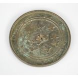 An Eastern Han Dynasty Chinese bronze mirror, 1-2nd century AD, depicting turtle and cranes.