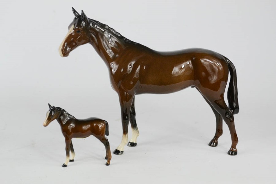 A Beswick horse 20cm high, and a Beswick foal, 8cm high.