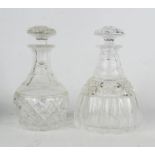 A pair of cut glass decanters, 23cm high.