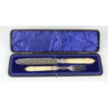 A Victorian silver plated and bone handled fish knife and fork, in original presentation box.