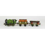 A Hornby LNER clockwork Locomotive, no 460, type 101, together with a German tin plate wagon, and