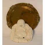 A white ceramic Buddha, together with a brass wine tray modelled with grapes to the edge.