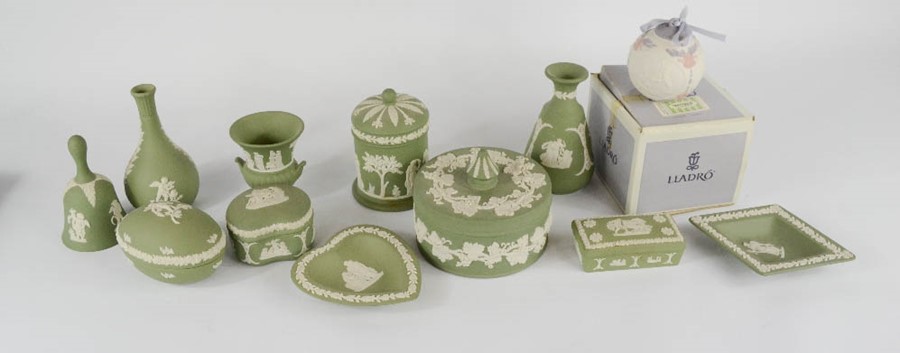 A quantity of green Wedgwood to include trinket boxes, vases, bell etc, together with Lladro.