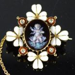 A French yellow metal brooch, enamelled with white petals, and red enamel borders to the diamonds,