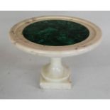 A white marble tazza having a malachite roundel centre.