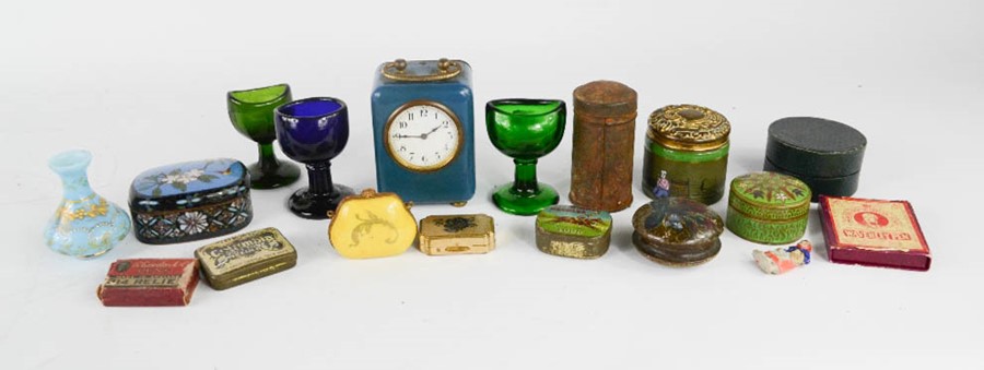 A quantity of trinket boxes, antique eye baths, alarm clock, and curios.