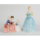 Two Royal Doulton figures; Enchantment HN2178, 20cm high, and The Bedtime Story HN2059.