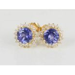 A pair of 18ct gold, tanzanite and diamond earrings, 3.1g.