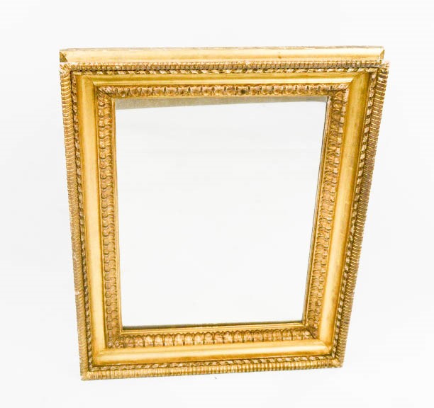 A 19th century giltwood wall mirror, with petal moulding, 75 by 58cm.