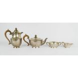 A silver four piece tea service, Birmingham 1922, 39.95toz total.