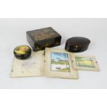 A black lacquered box with Chinoiserie decoration, an oval trinket box and one depicting a