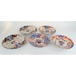 Five 19th century Imari chargers with scalloped edges, 32cm diameter.
