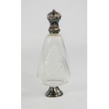 A French glass perfume bottle with white metal lid.