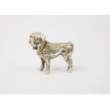 A silver miniature model pug dog, marked 925, 2½cm high.