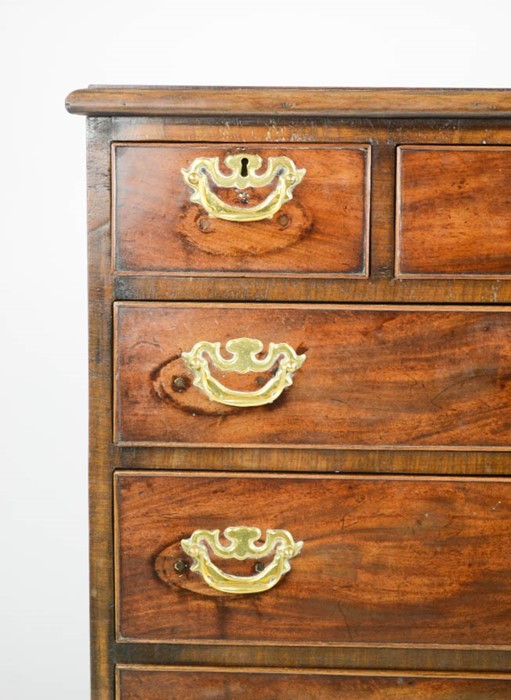 A Georgian chest of drawers, with three small above three long graduated drawers with cockbeaded - Image 3 of 3