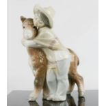 Lladro child and donkey.