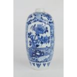 An early 19th century blue and white Chinese jar, depicting garden scenes, 26cm high. A/F