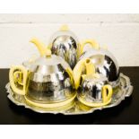 A retro four piece chrome tea service.