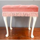 A pink velour upholstered dressing table stool.