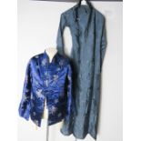 A Chinese blue silk jacket and a blue silk dress.