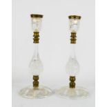 A pair of cut glass and gilt brass candlesticks, 28cm high.