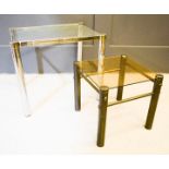 Two chrome and glass occasional tables.