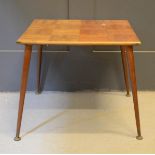 A parquetry 1950s side table.