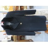A Versace Couture black coat, S.